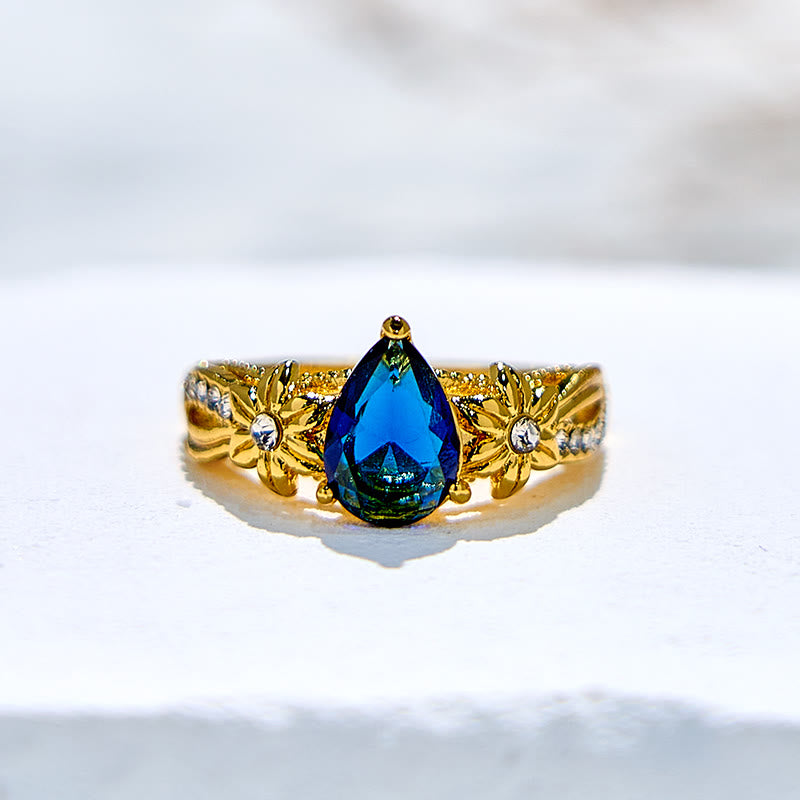 Olivenorma Blue Topaz with Floral Zircon Accents Ring