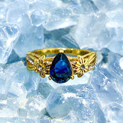 Olivenorma Blue Topaz with Floral Zircon Accents Ring