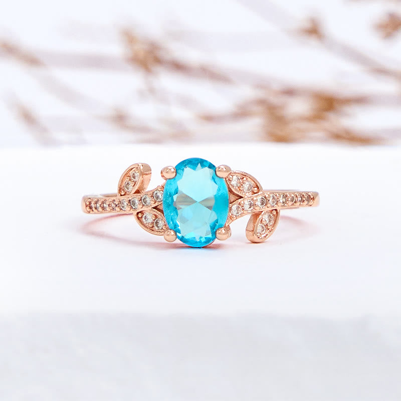 Olivenorma Oval Cut Blue Topaz Wrapped Leaf Ring