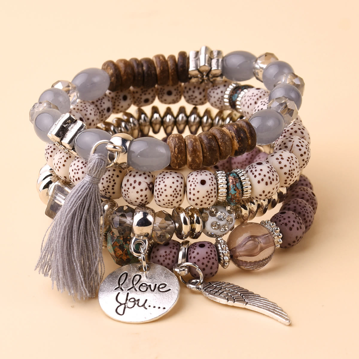 Olivenorma 4pcs Bohemia Bead Tassel Feather Bracelet Set