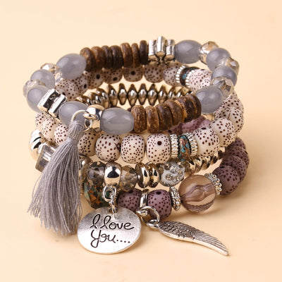 Olivenorma 4pcs Bohemia Bead Tassel Feather Bracelet Set