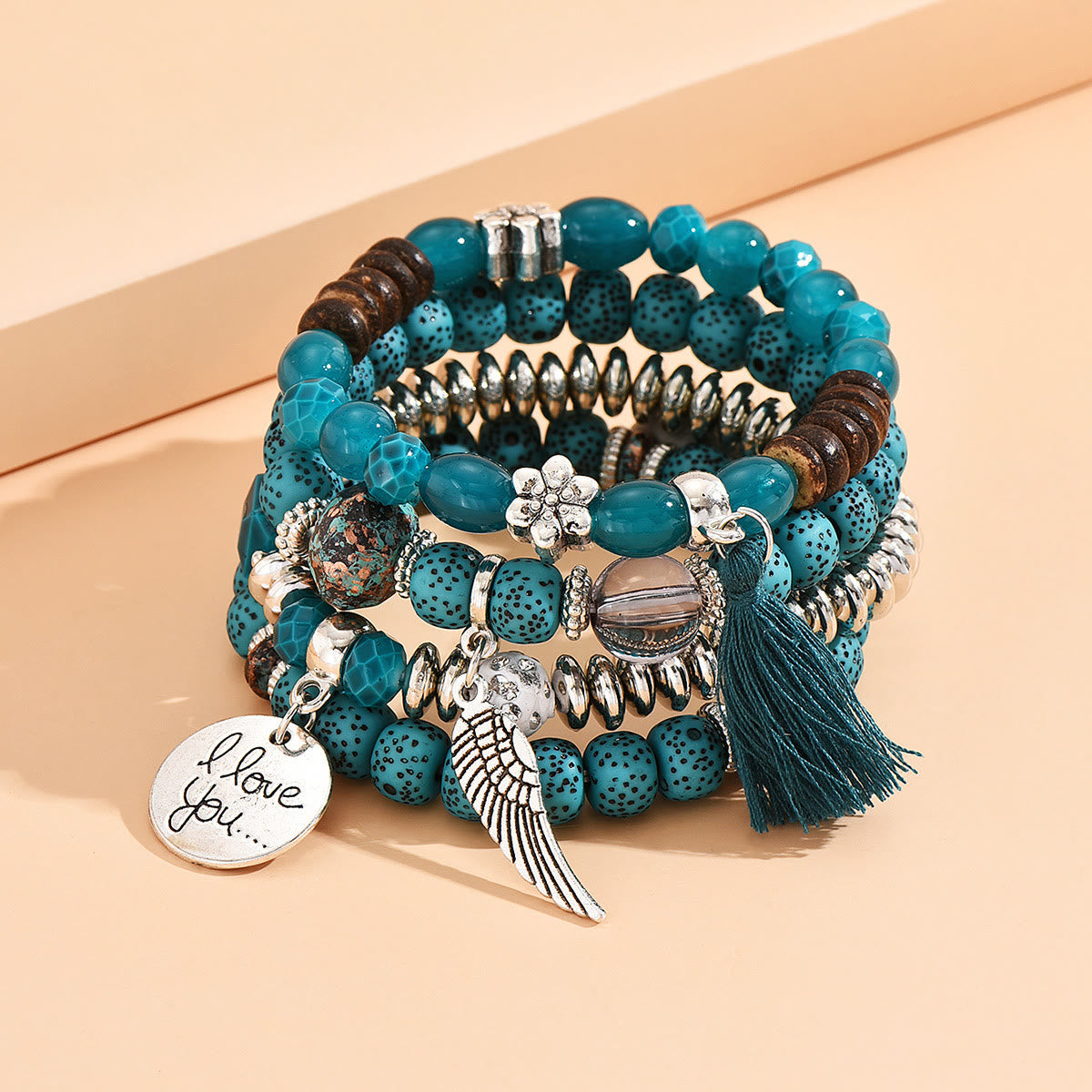 Olivenorma 4pcs Bohemia Bead Tassel Feather Bracelet Set