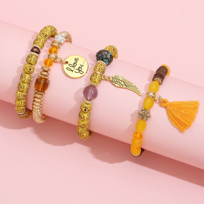 Olivenorma 4pcs Bohemia Bead Tassel Feather Bracelet Set