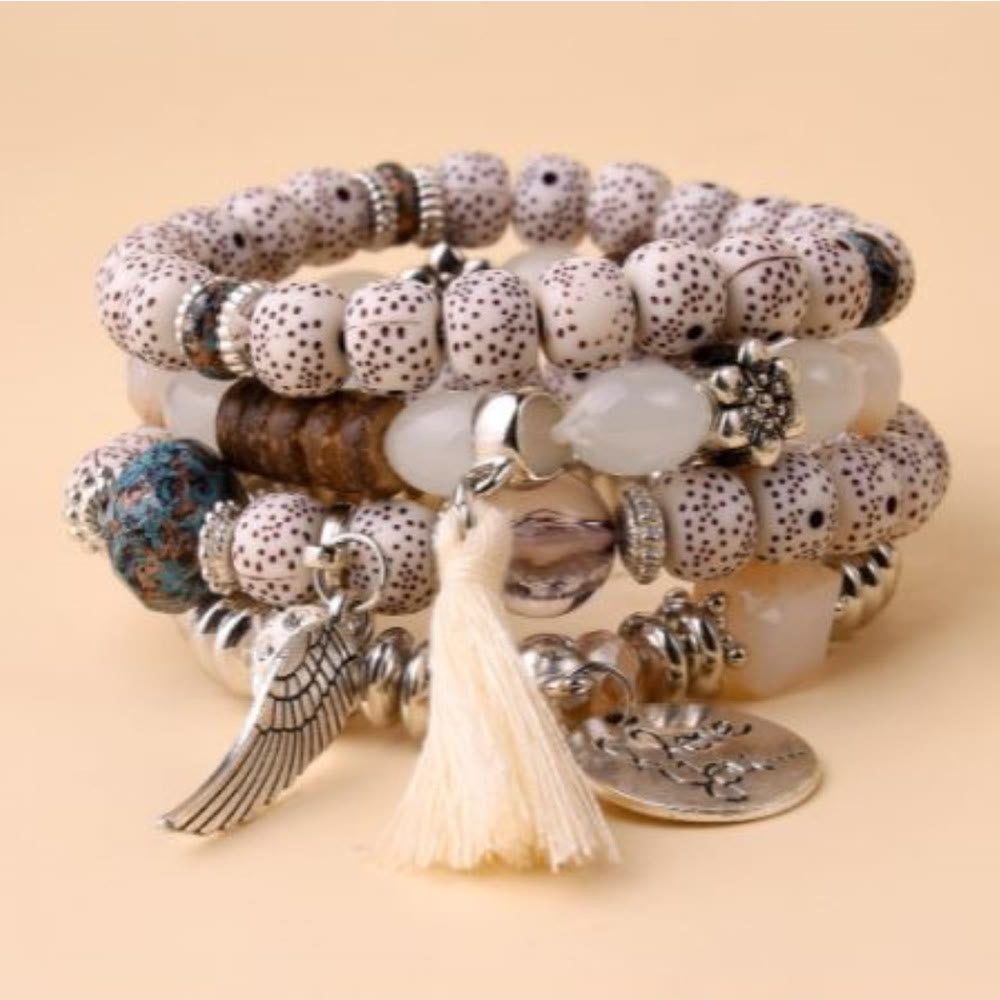 Olivenorma 4pcs Bohemia Bead Tassel Feather Bracelet Set