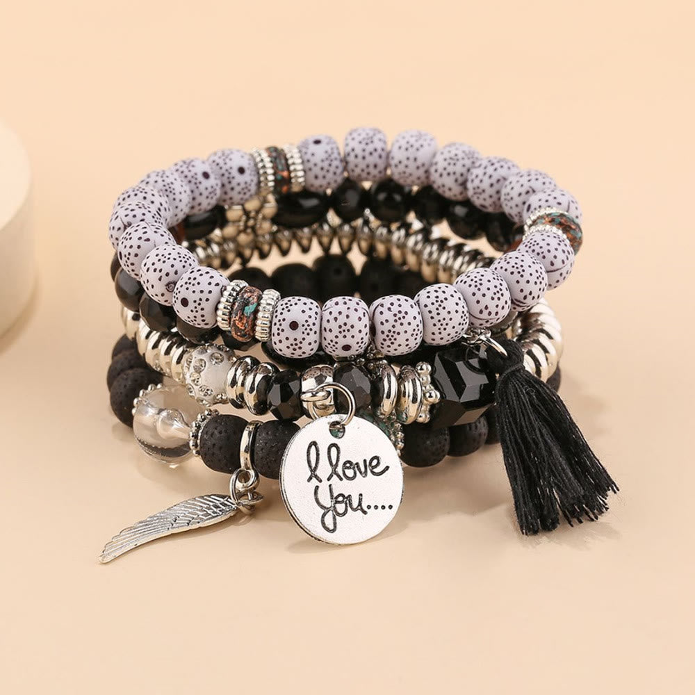 Olivenorma 4pcs Bohemia Bead Tassel Feather Bracelet Set